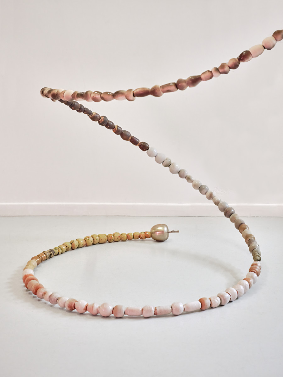 Camille Dumond, Everything but sliced, Ferme de la Chapelle, Geneva, Sept-Oct 2025. Camille Dumond, Bullet time, Suspension, steel, earthenware, stoneware, 4.5 m, 2025. Photo credit: ©Nicolas Delaroche Studio