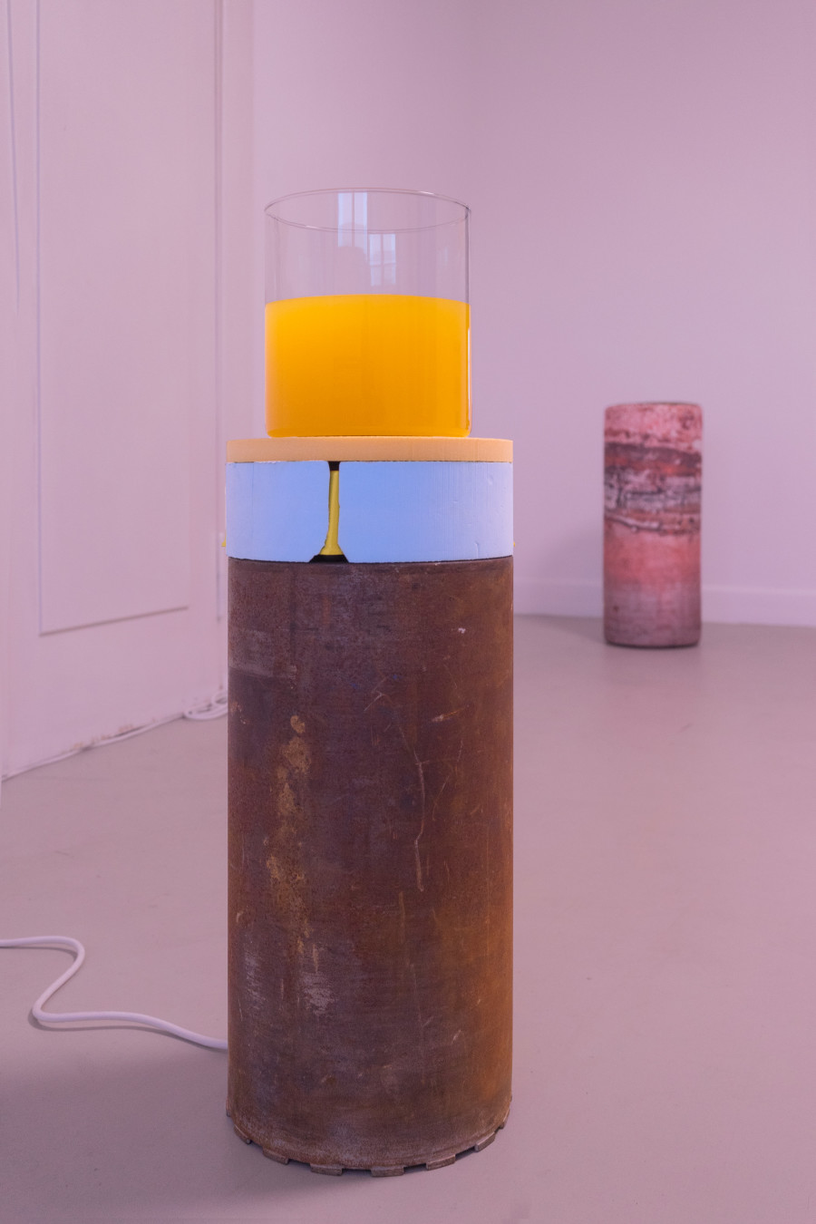 Susi Gelb: Artificial Eddy 2, 2022, drilling apparatus, magnetic stirrer, glass vessel, water, 80 x 25 x 25 cm / Drill Core 03, print on textile, foam, 74 x 30 x 30 cm