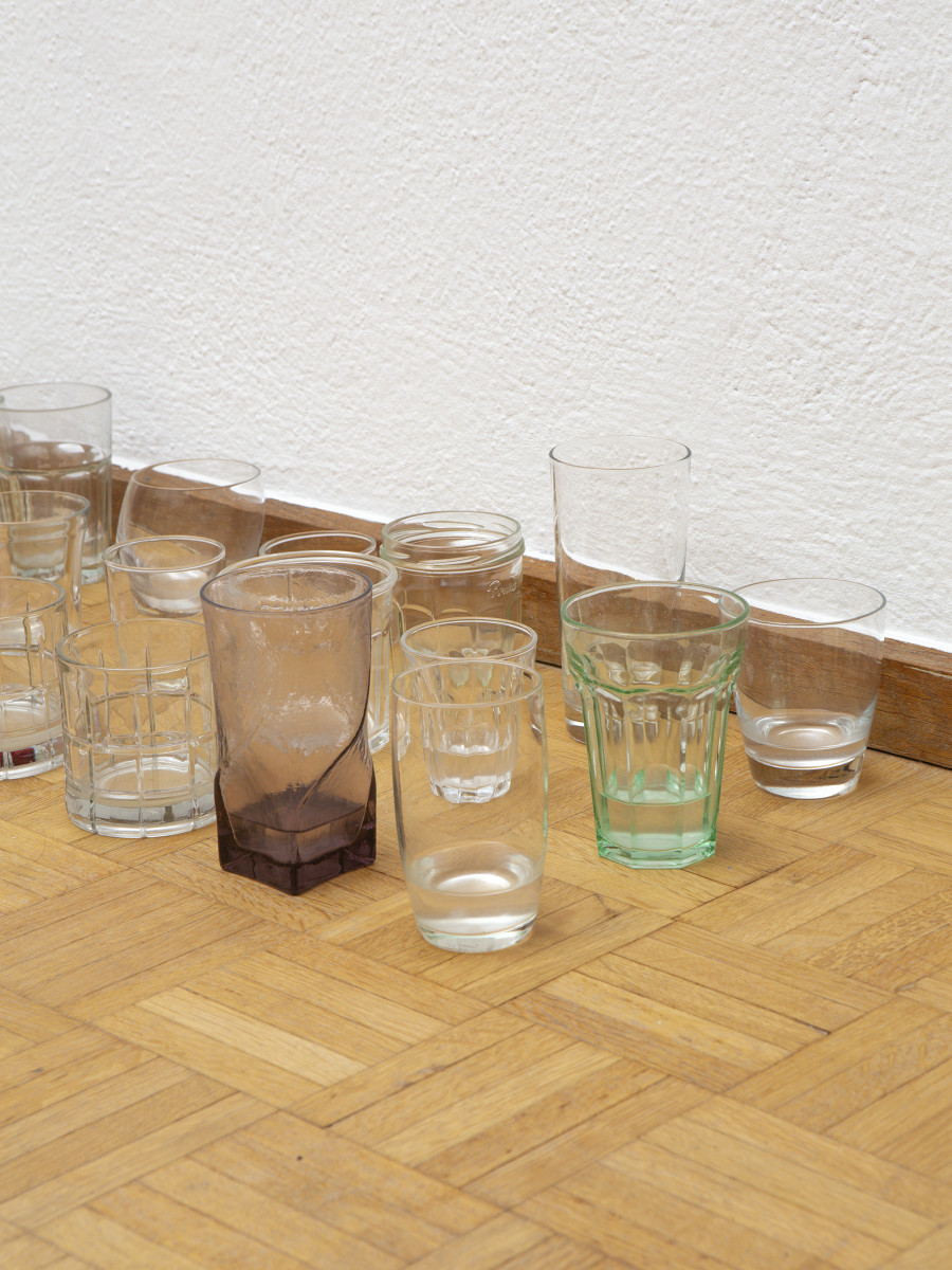 Amina Ross, Untitled, 2020 - ongoing, Glassware, NYC rainwater (upon evaporation, the NYC rainwater is replaced with the one from Zurich). Picture credit: Philipp Rupp/Julien Gremaud. Courtesy of the artist and Sentiment