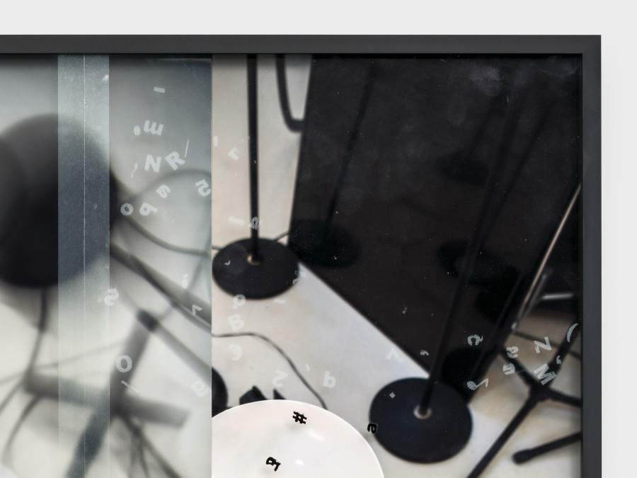 Daria Blum, the window in the toilet stall is open and i see two kids in the courtyard eating tesco sandwiches, detail, 2026, Archival pigment print, UV print and vinyl on museum glass, tape, finger prints, 46 × 50.5 cm. Photo credits: Julian Blum