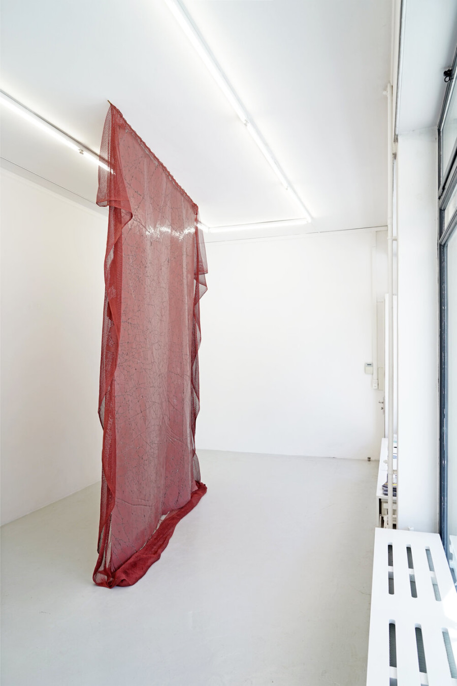 Haus, 2021. Dyed concrete, nylon mesh, 350 x 250 x 40 cm