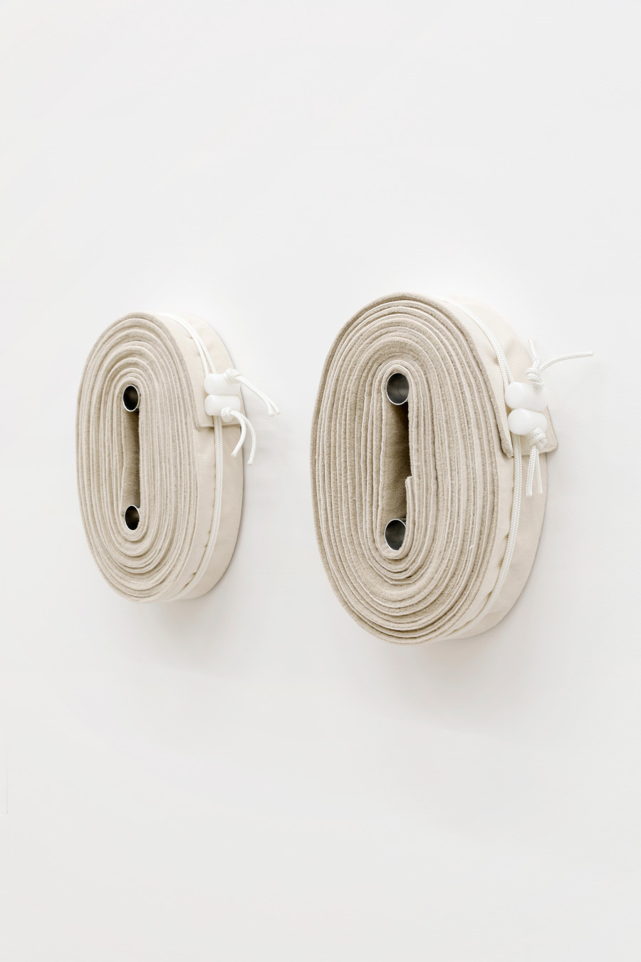 Exhibition View Aurélien Martin Solo Show «The North Face» view on Aurélien Martin, Untitled (Hoses), 2021, Cotton fabric, fleece, wood, synthetic cord, plastic, aluminium, 43 x 21 x 10 cm, Edition of 3 at Fabienne Levy, Lausanne, 2021 / Photo: Neige Sanchez / Courtesy: the Artist and Fabienne Levy