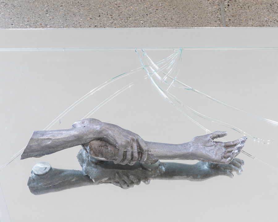 Exhibition view ‘This is the time of sweet sweet change for us all’; Emma Passera, 7 days without you, 2024, detail, aluminium arm and leg, mirror, glass, 260 x 130cm, CALM - Centre d'Art La Meute, Lausanne, Switzerland, 2024 / Photo: Théo Dufloo / Courtesy of the artist and CALM - Centre d'Art La Meute.