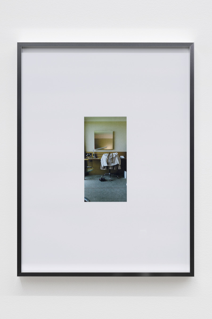 Mati Jhurry, duty free_Emirates Staff No.460596, 2025, Series of 9 photographs pulled from the archive of performance Emirates Staff no. 460596, digital print on paper, aluminium frame, 31 × 41 × 2 cm each. Photography: Gina Folly / all images copyright and courtesy of the artists and For, Basel