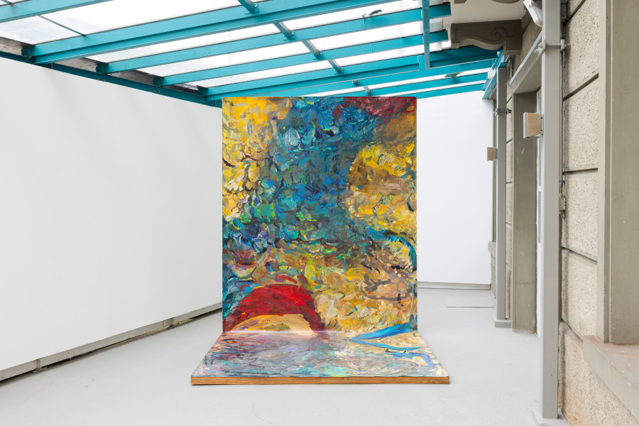 Michele Gabriele, “Study for the Plumage of a Parrot. An Unbothered, Sad, and Cringe Parrot. Indifferent to its Context.”, from the Solo Show “Brambora” at Kaly Gallery, Lucerne, CH. Acrylic on canvas, painted wooden structure, 159 x 78 3/4 x 59 in, 404 x 200 x 150 cm, 2025. Courtesy of the Artist and Kali Gallery. Photo by Kim da Motta