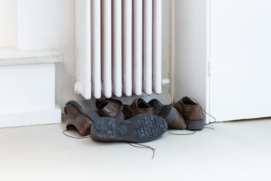 Francesco De Bernardi, “Stroll”, Four pairs of shoes, wood, black paint, 2022. Photo credits: Mattia Angelini