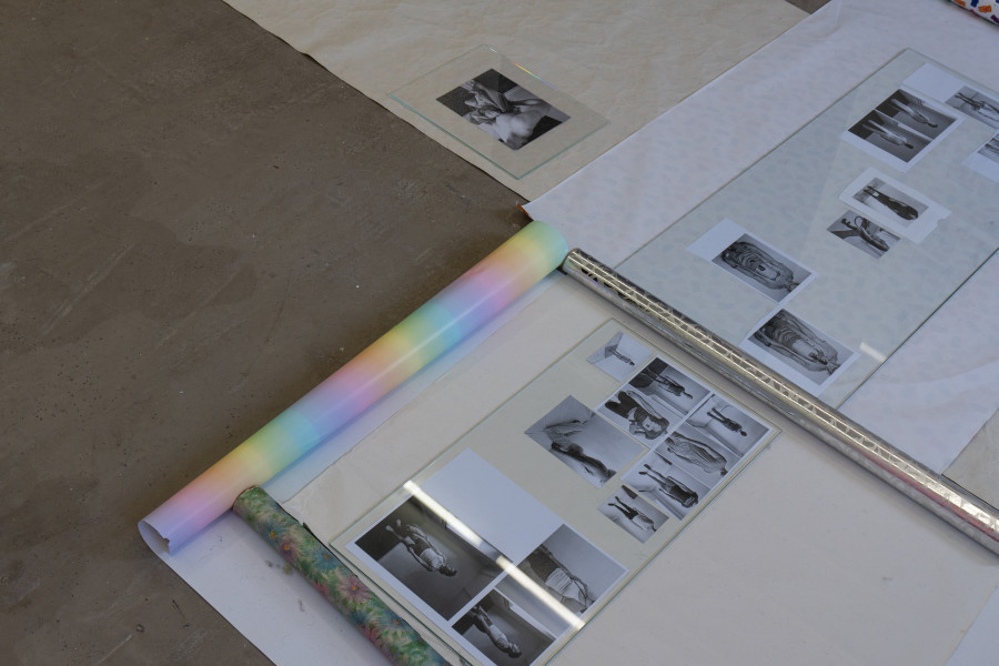 Exhibition view, Sven Gex, celebratory, Halmet, Zürich, 2025. Sven Gex, celebratory, 2025, gift wrapping paper, nails, glass, printed images from the ‚character fitting‘ series 2021-ongoing