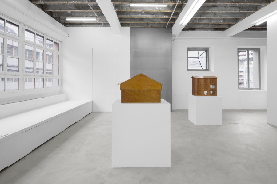 Exhibition View Group Show; view on Victoria Colmegna, Toys of the rich, 2025, 55 × 38 × 72 cm and Anonymous plots, 2025, 80 × 35 × 70 cm, dollhouses at Forde, Geneva, 2026 / Photo: Théa Giglio / Courtesy: the artist, Galerie Oskar Weiss and Forde